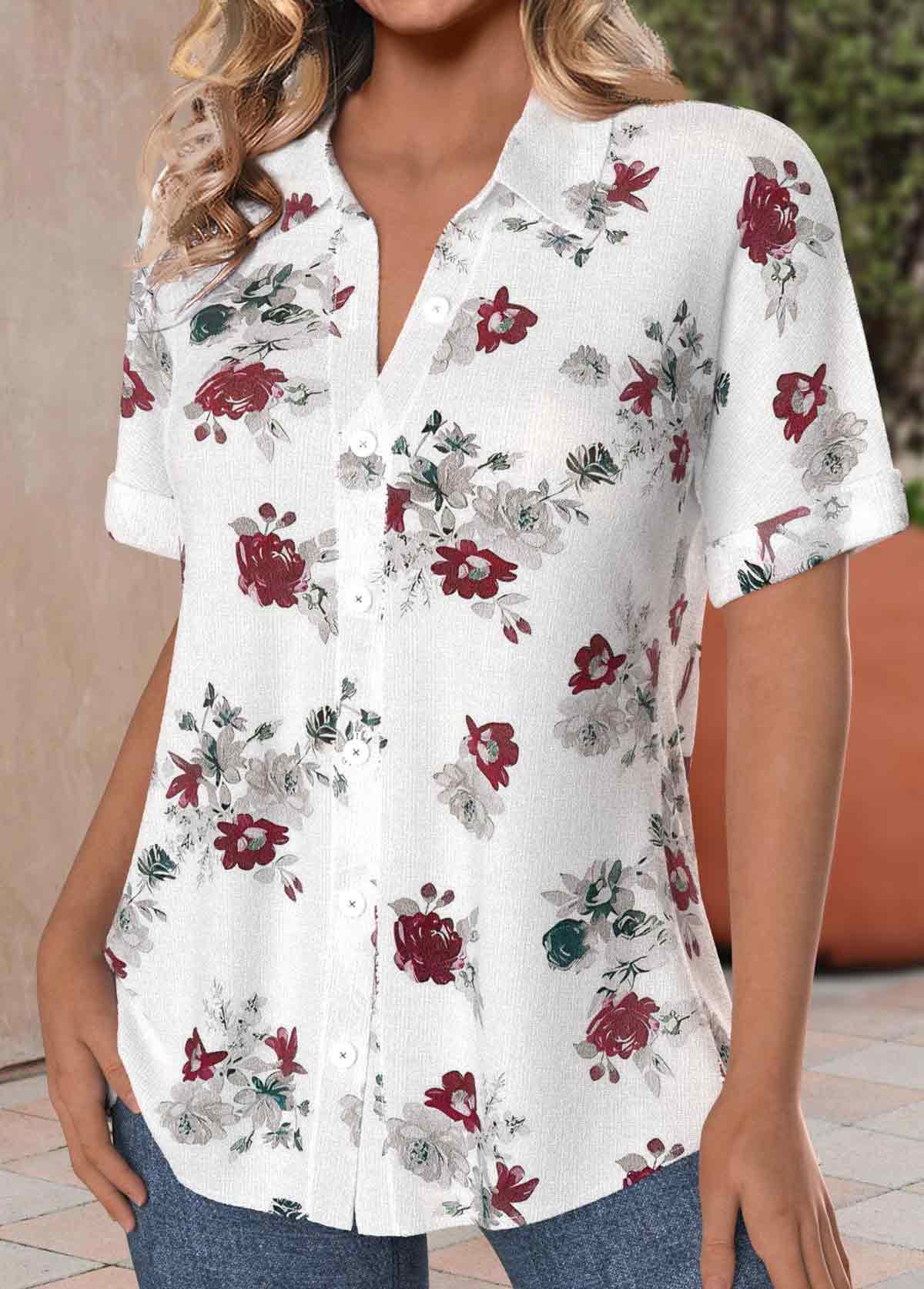 White blouse with floral print, front buttons, short sleeves and shirt-style collar.