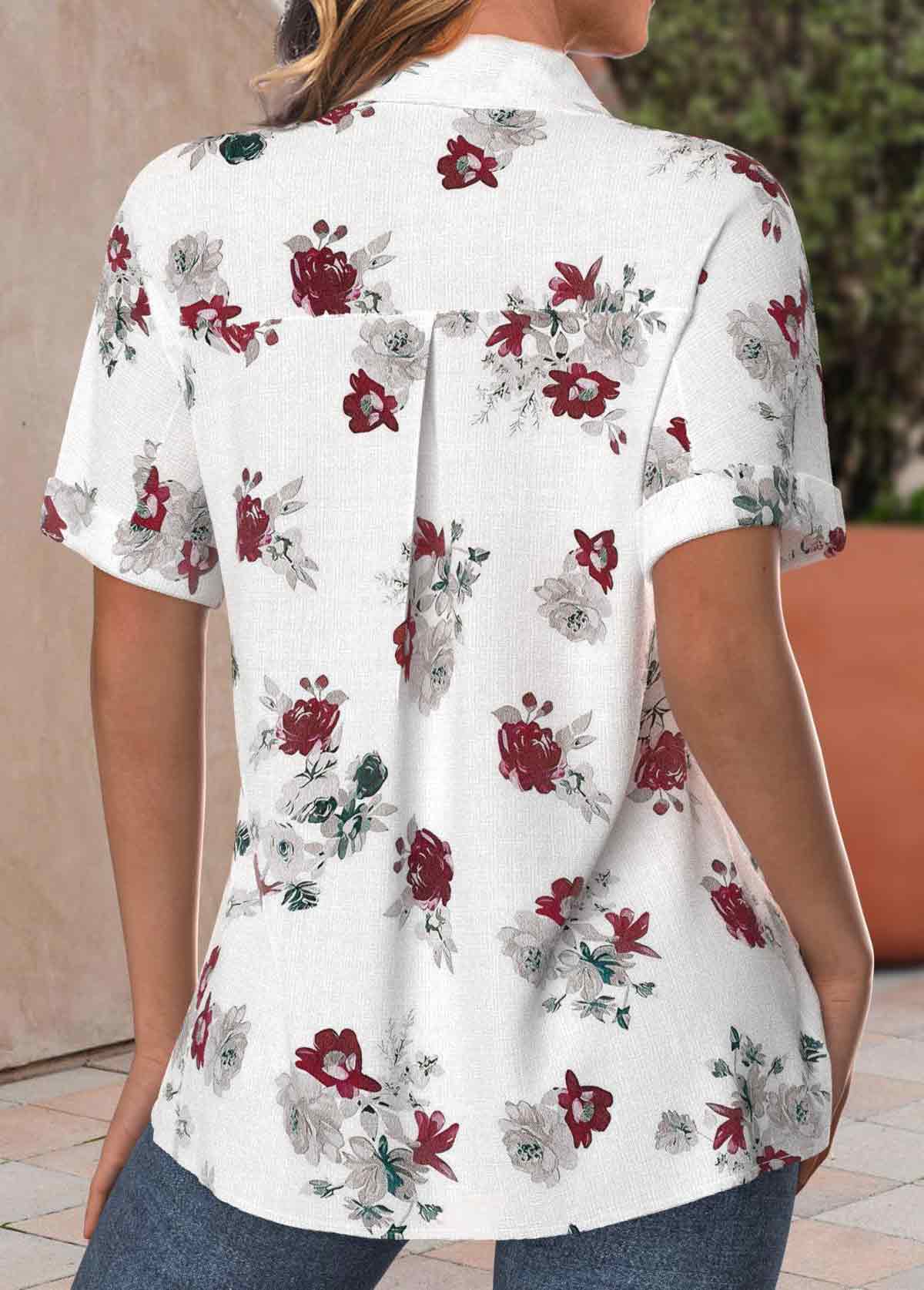 White blouse with floral print, front buttons, short sleeves and shirt-style collar.